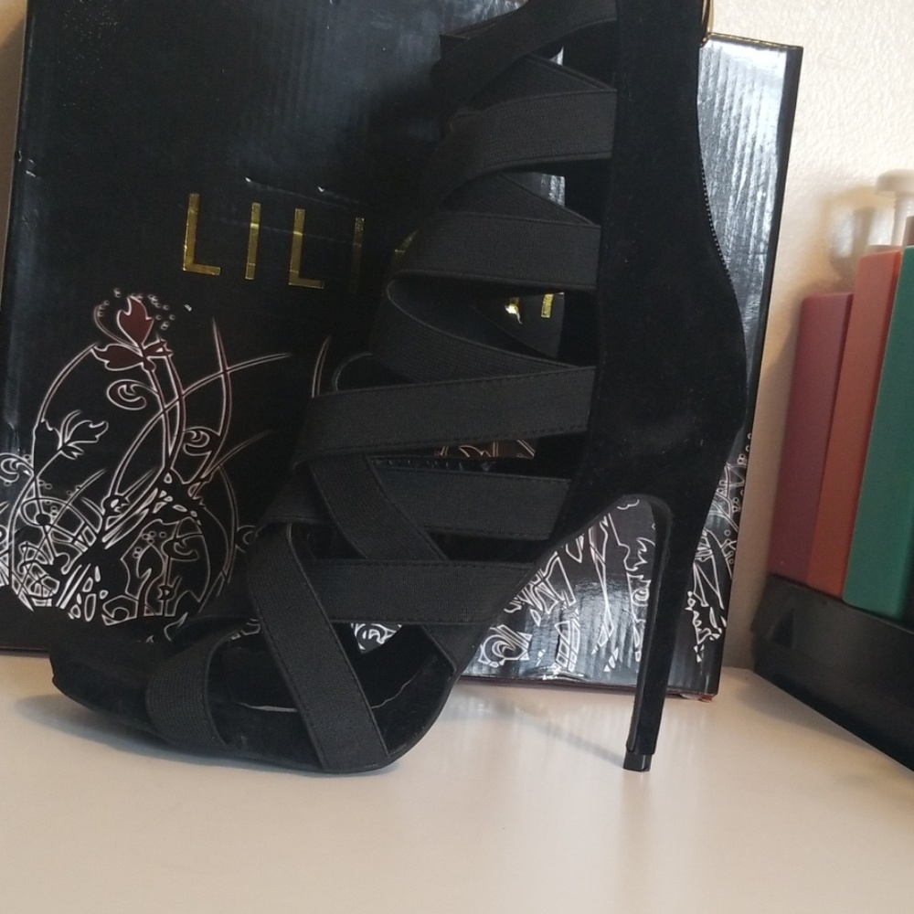 Black zip up heel shoes